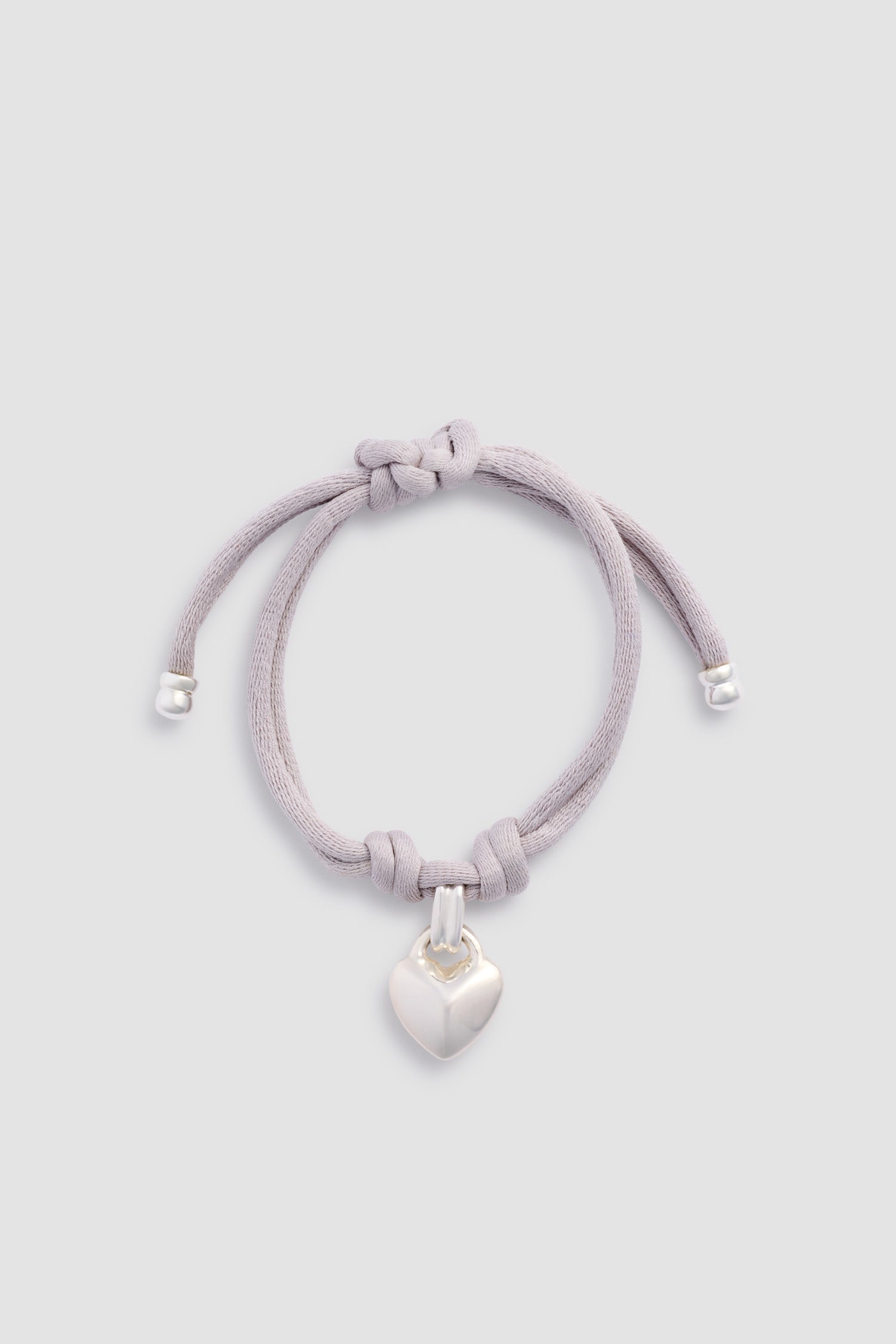 Patou JW153 bracelet pendentif coeur ruban argenté TU