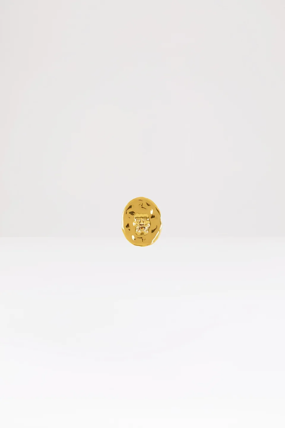 Patou H20JW021 broche visage laiton doré petite