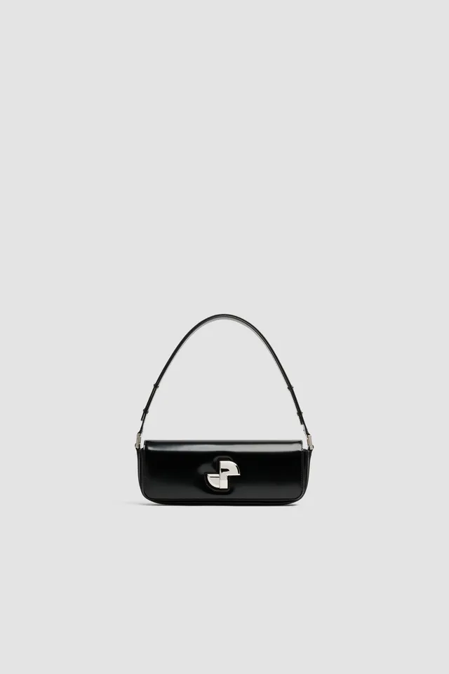 Patou Le Lock sac cuir verni noir TU