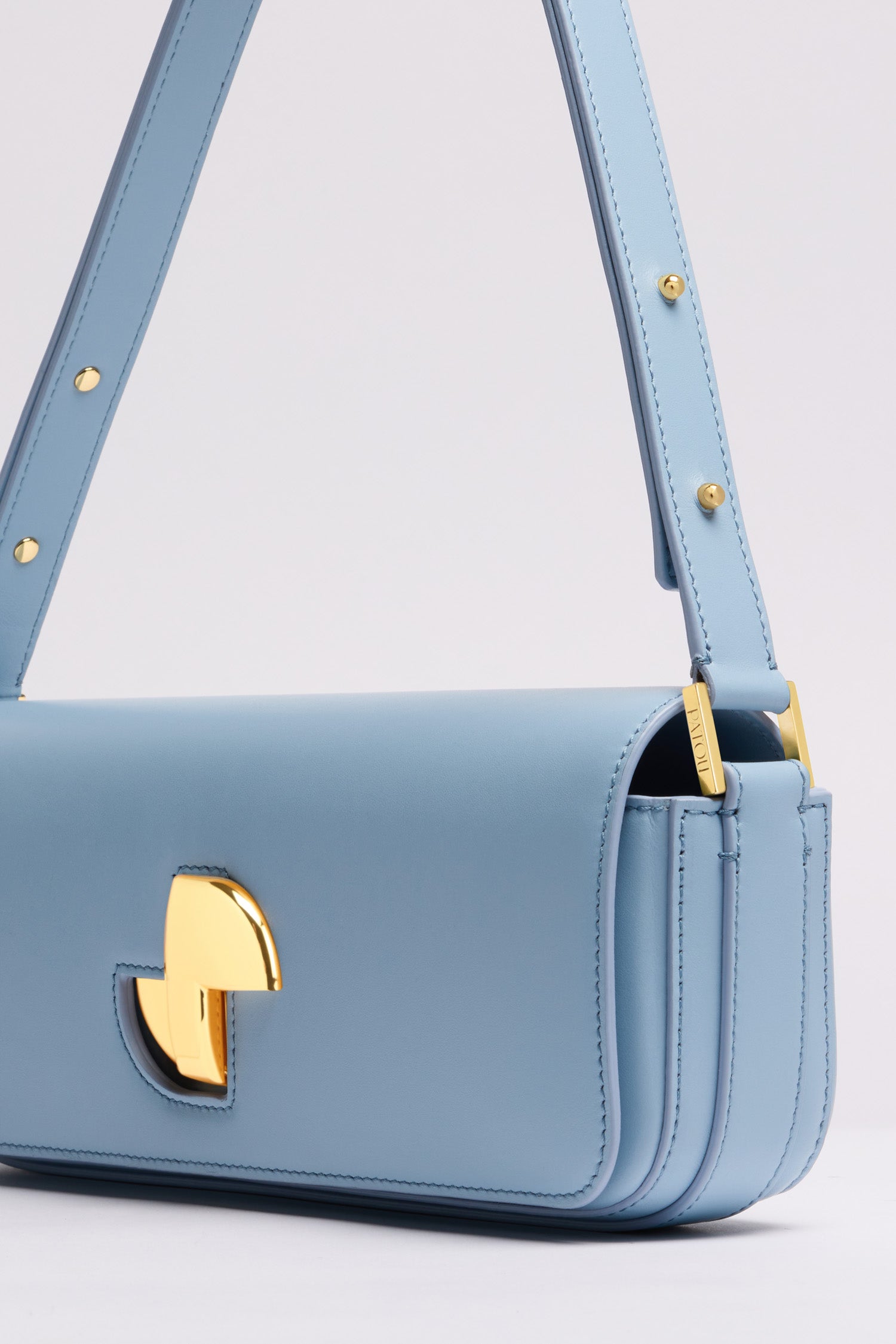 Patou Le Lock P25BA0205000637B sac cuir bleu skylight