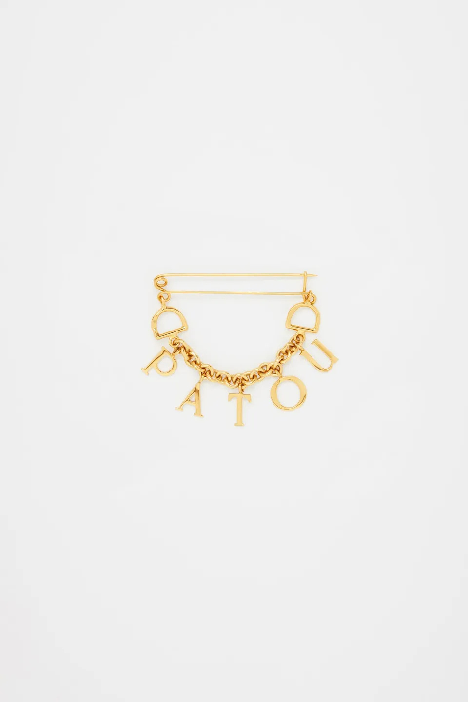 Patou P23JW0991002299G broche laiton doré Gold lettres