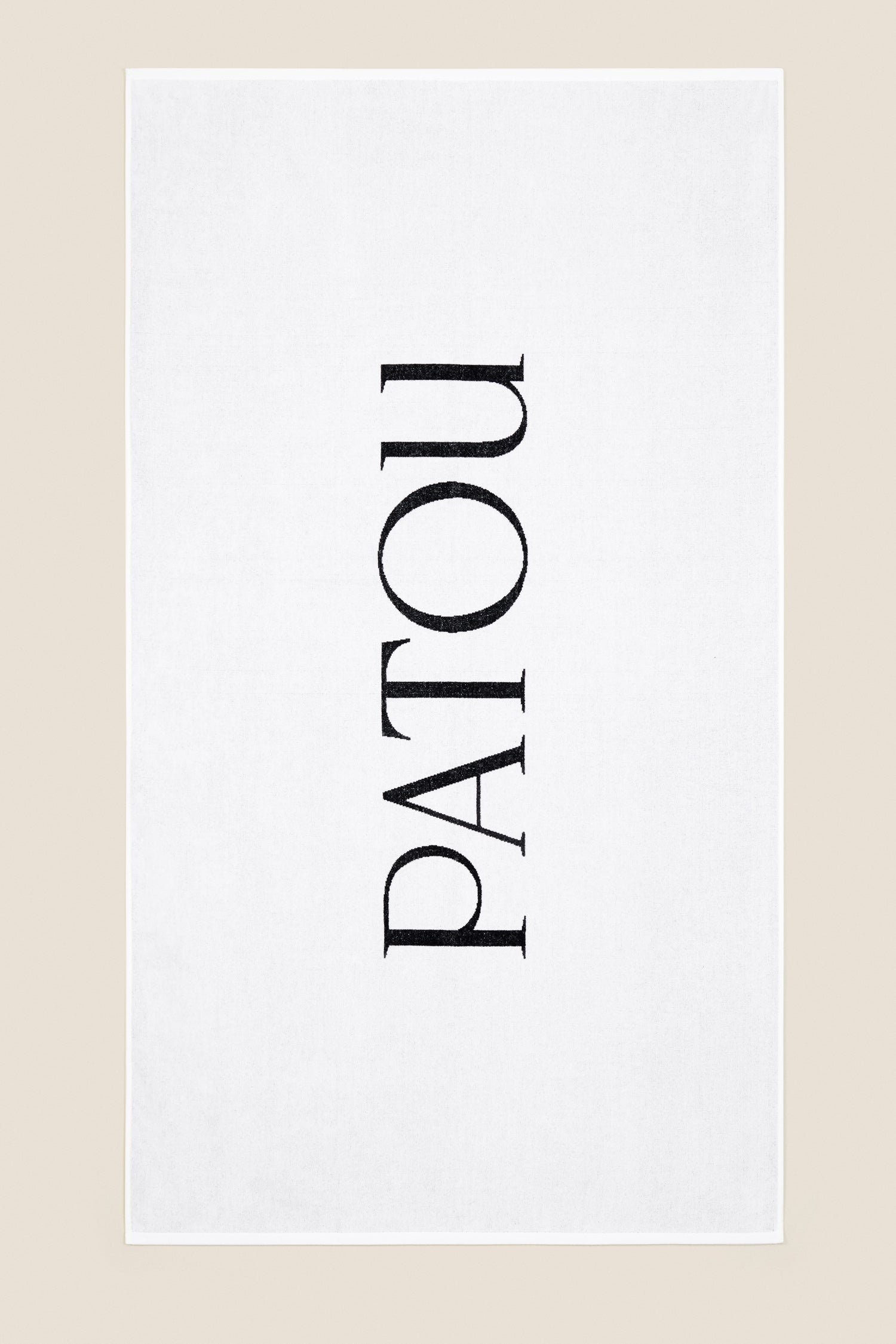Patou Accessories A20SW002 serviette de plage noir blanc coton