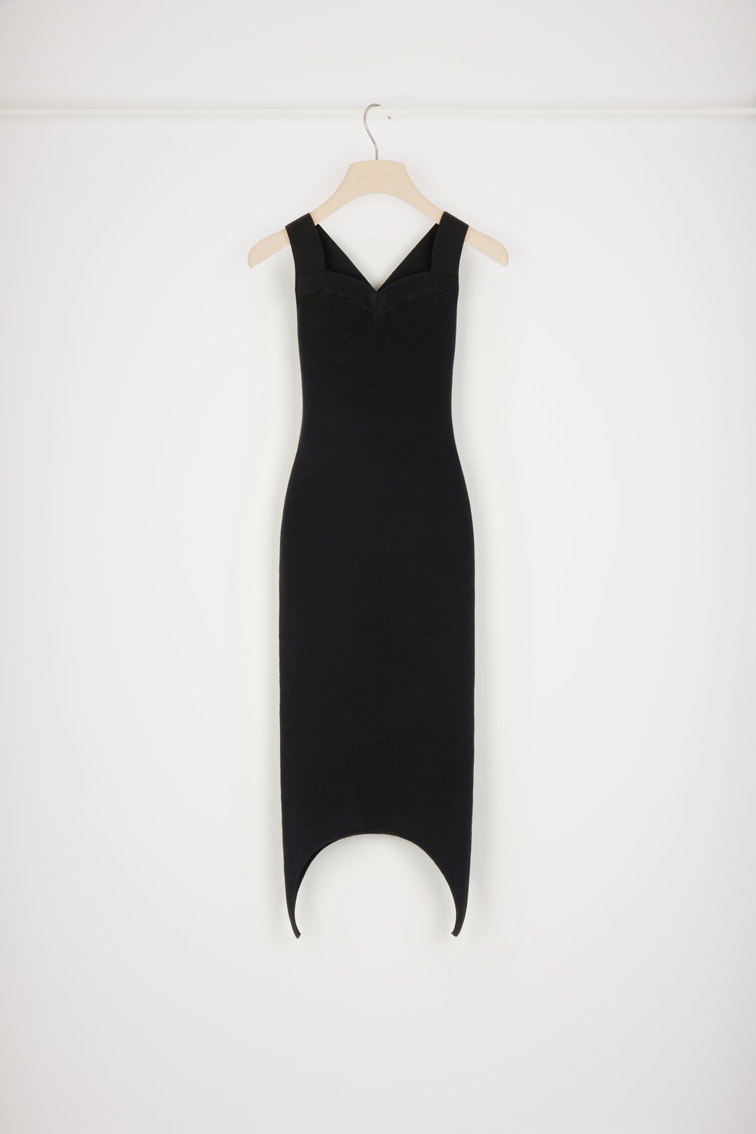 Patou KN118 robe maille noire laine ourlet courbe moulante