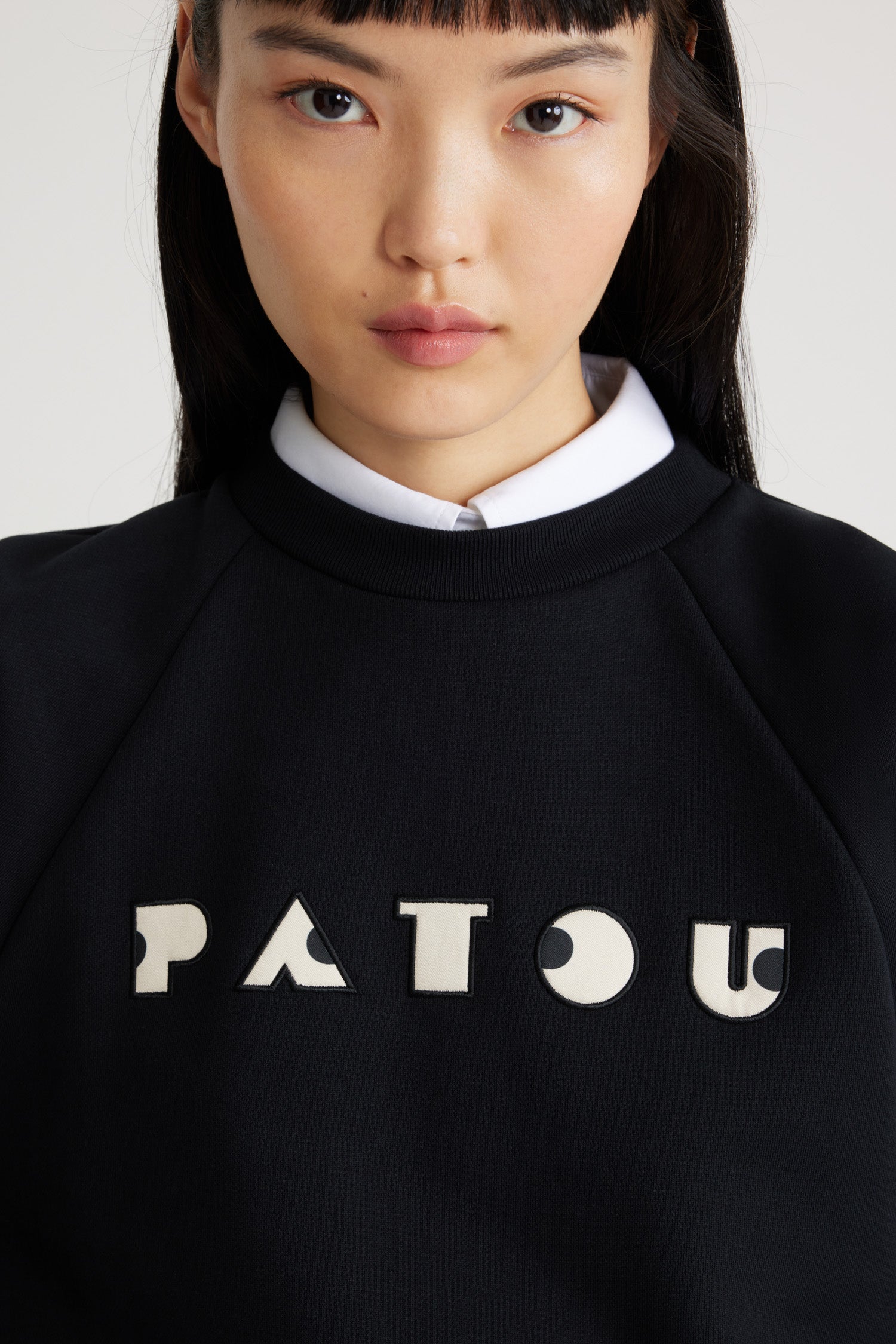 Patou JE129 sweat noir coton bio broderie Art Déco