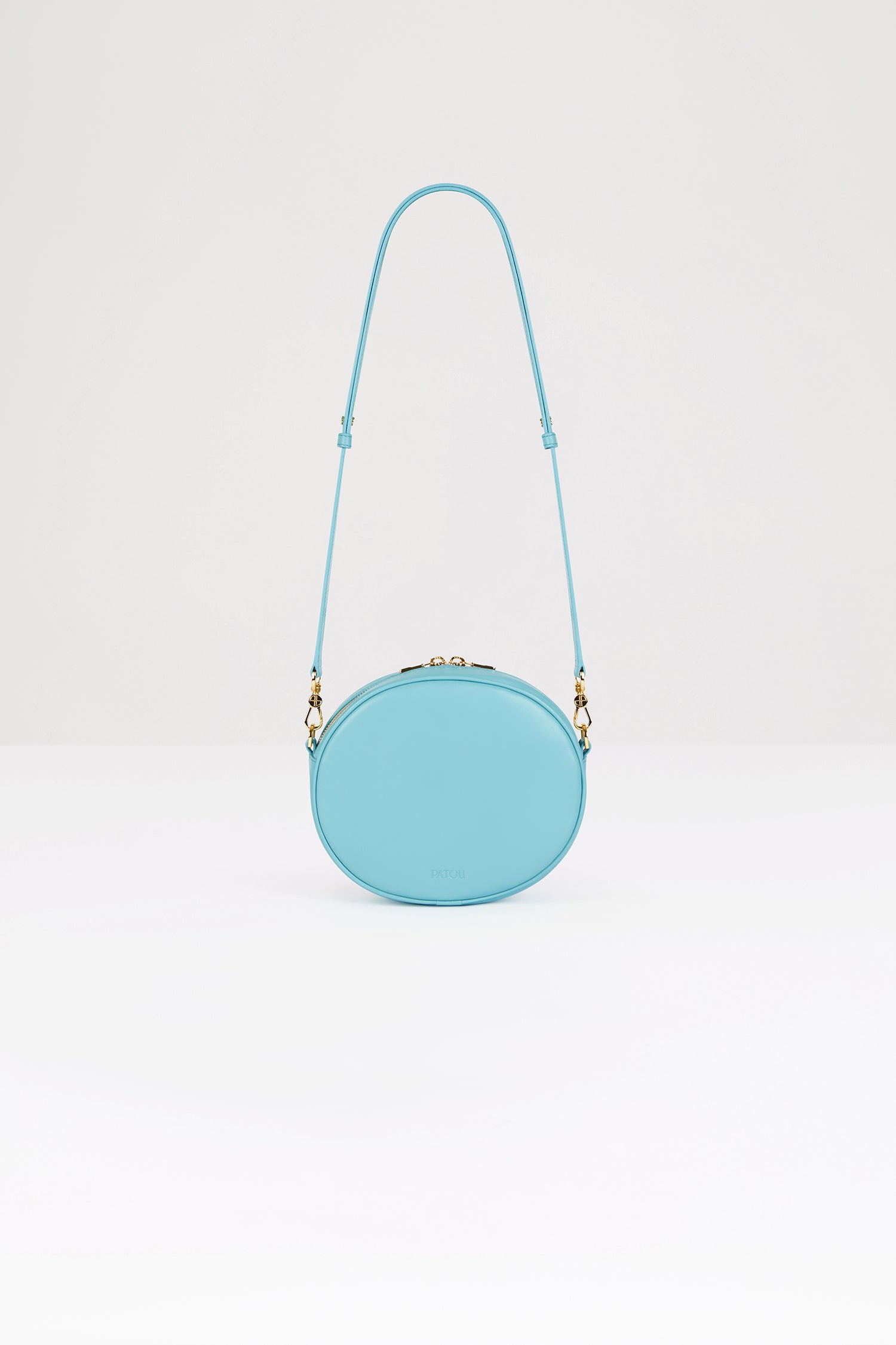 Patou Le JP sac cuir bleu bijou 21 cm bandoulière monogramme