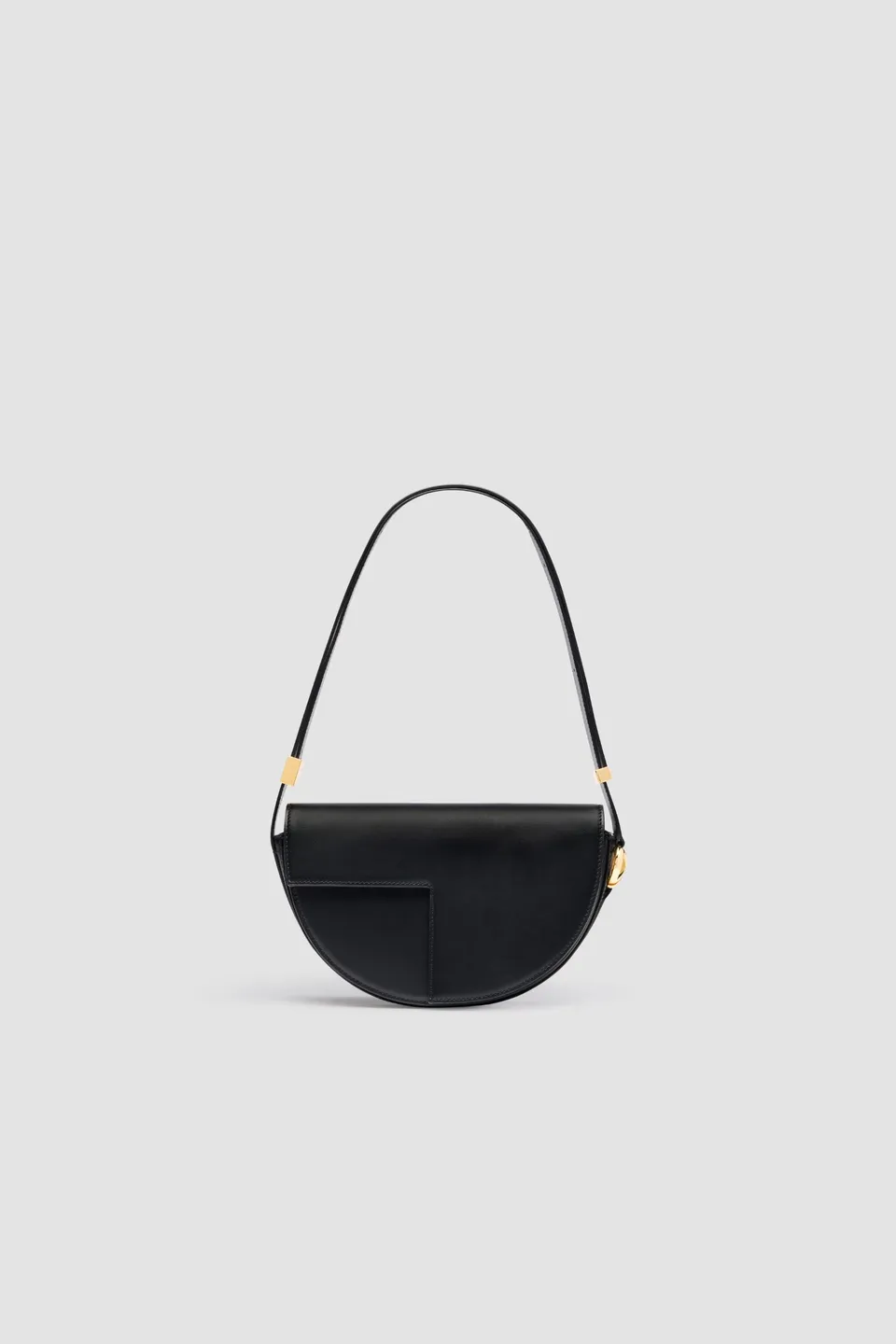Patou Le Patou sac cuir noir demi-lune édition limitée