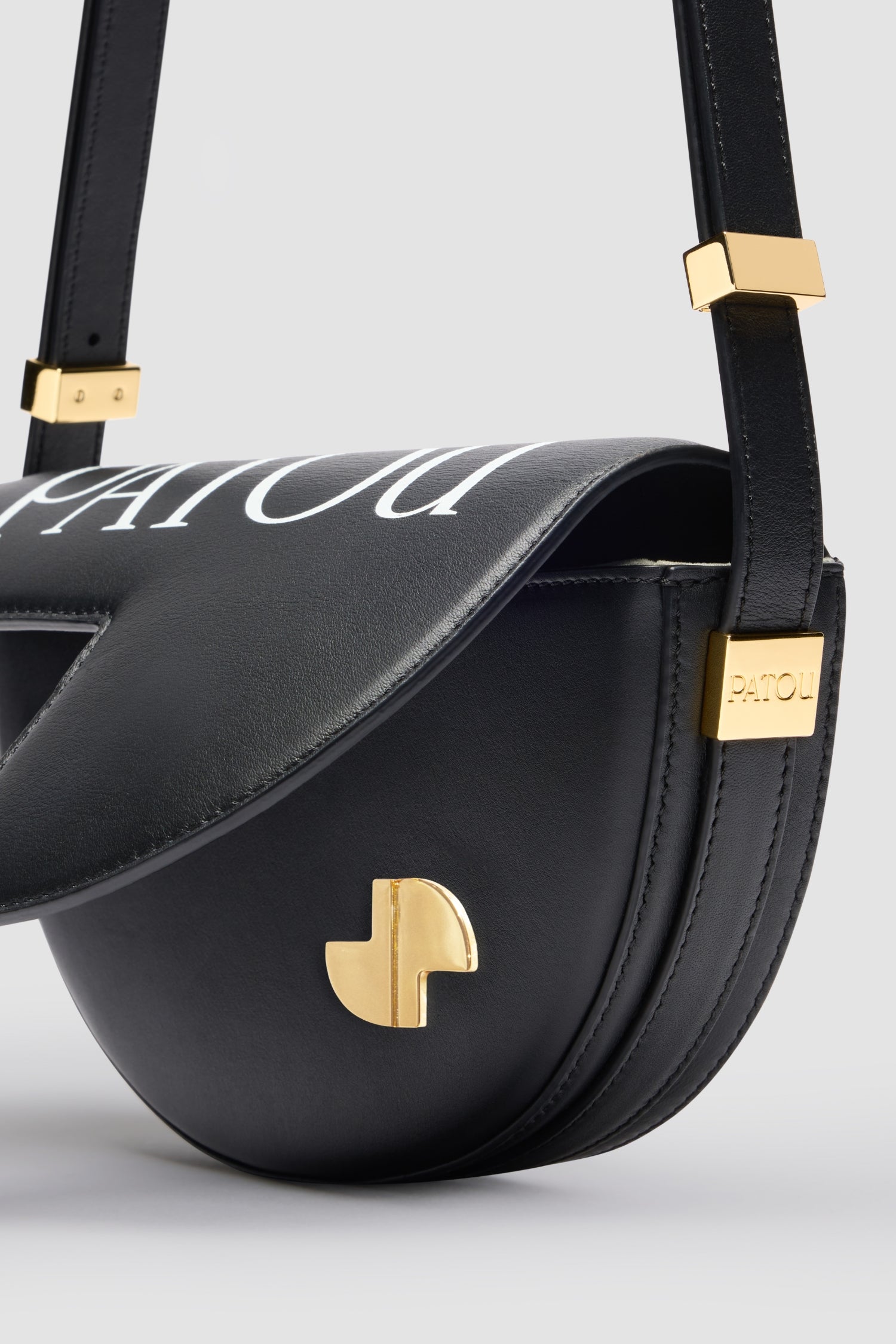 Patou Le Petit Patou sac cuir logo noir et blanc