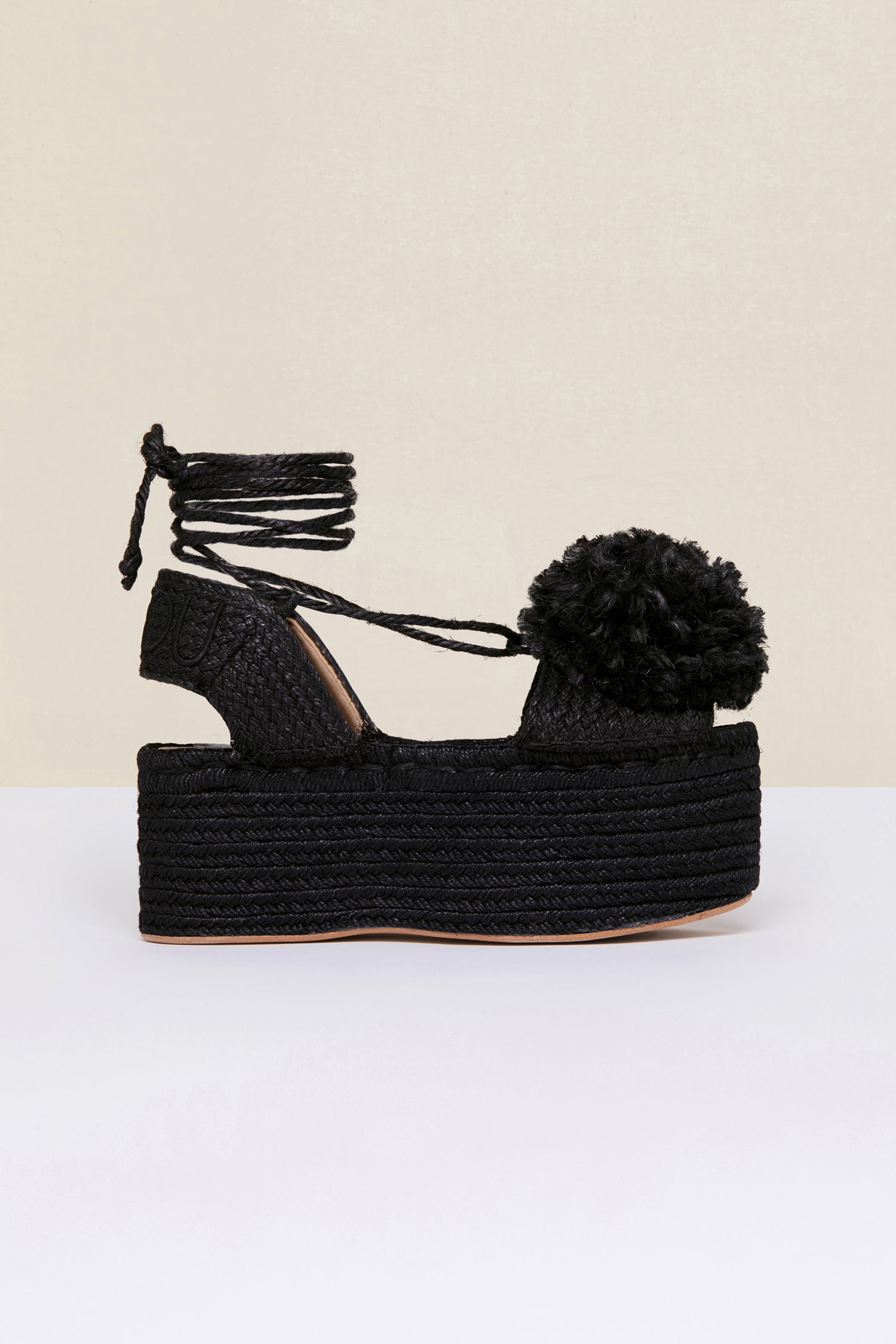 Patou Pompom espadrilles compensées noires jute