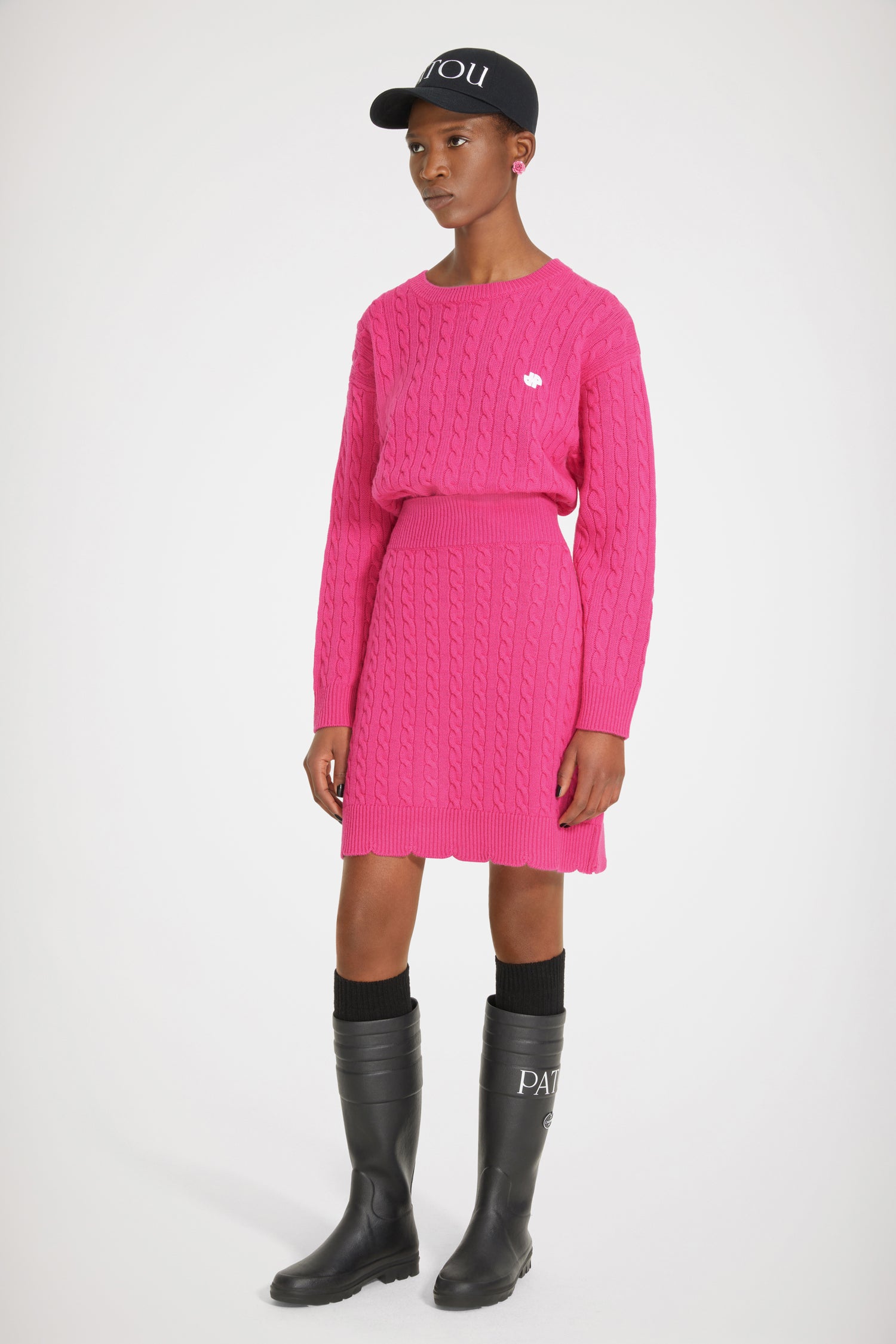 Patou H22KN1088056474F pull laine mérinos fuchsia torsadé
