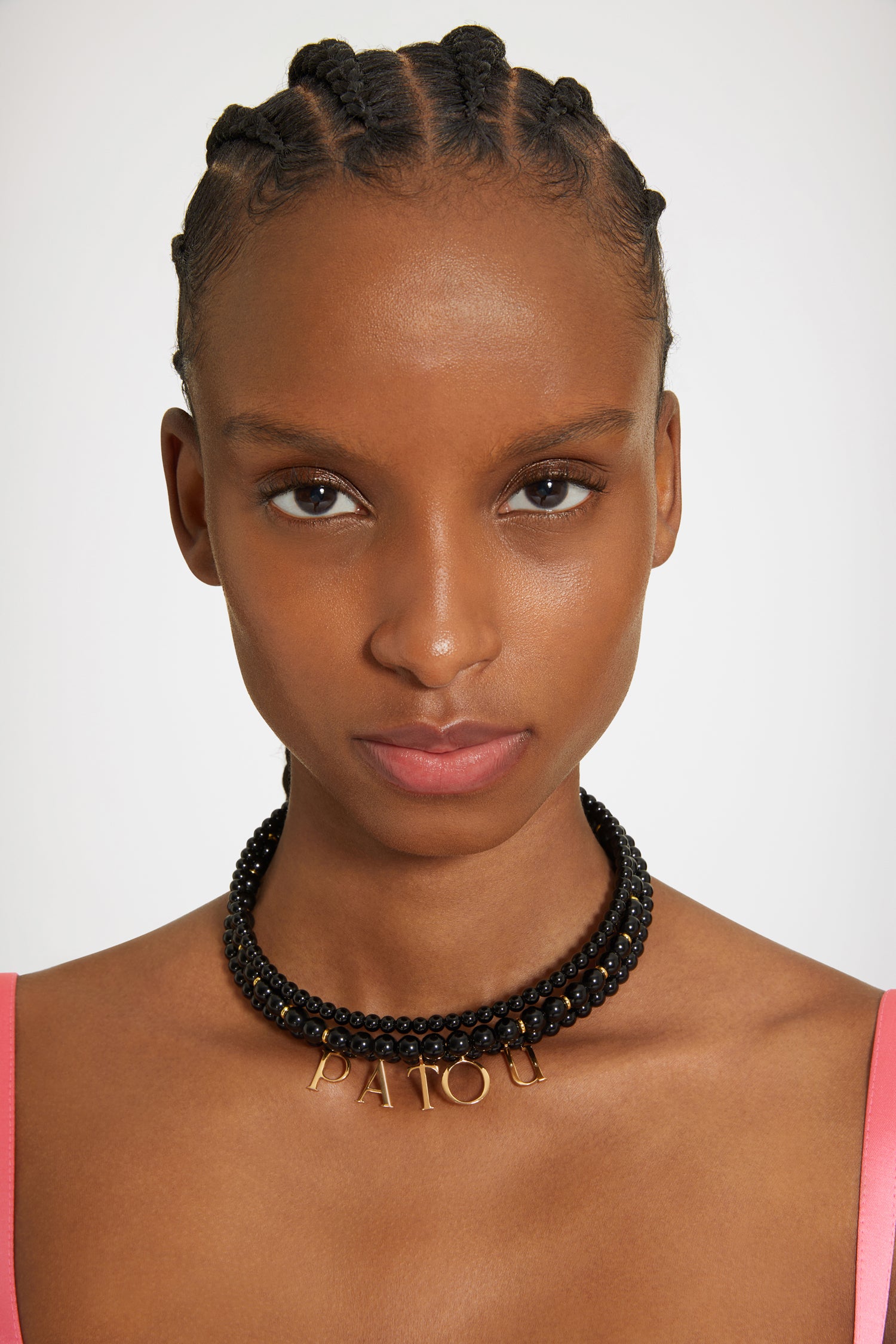 Patou JW101 collier noir perles verre lettres dorées