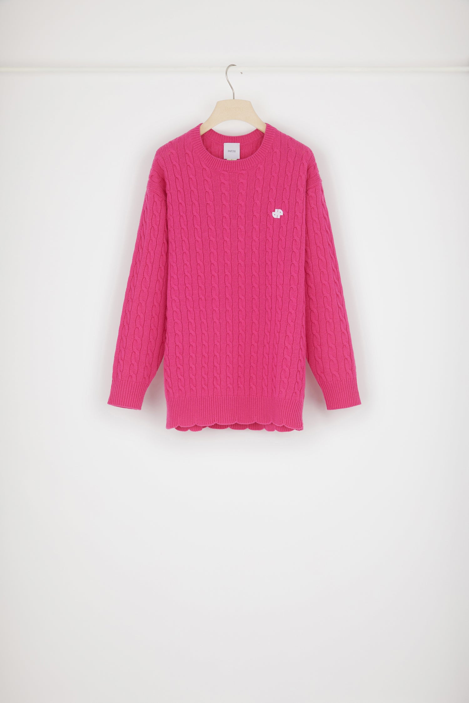 Patou H22KN1088056474F pull laine mérinos fuchsia torsadé