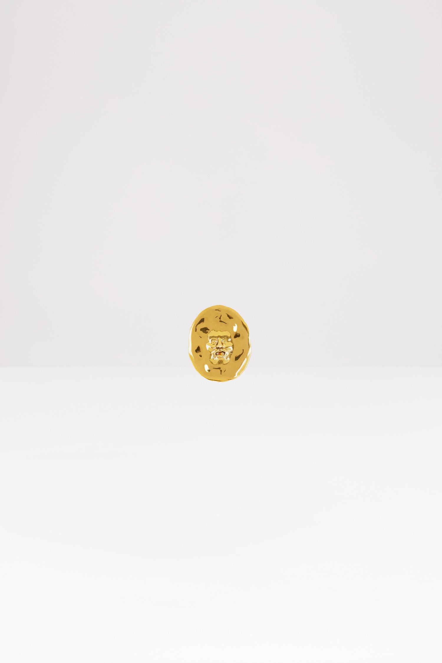 Patou H20JW021 broche visage laiton doré petite