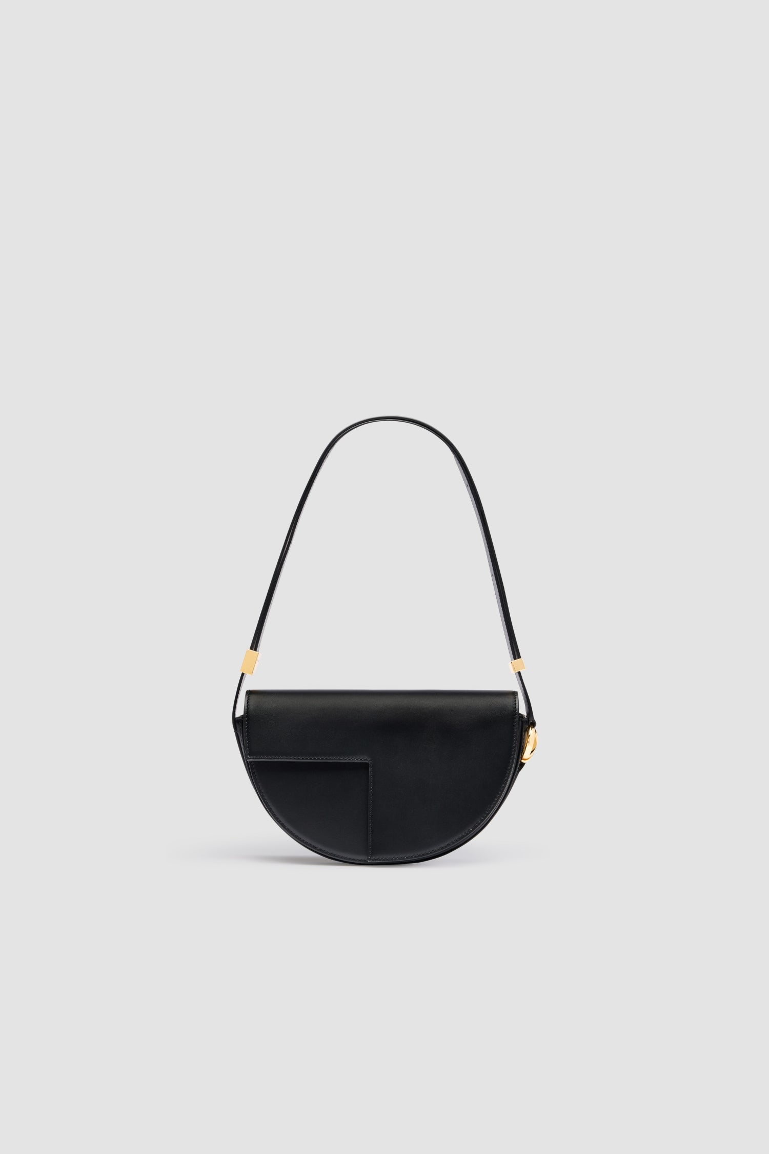 Patou Le Patou sac cuir noir demi-lune édition limitée