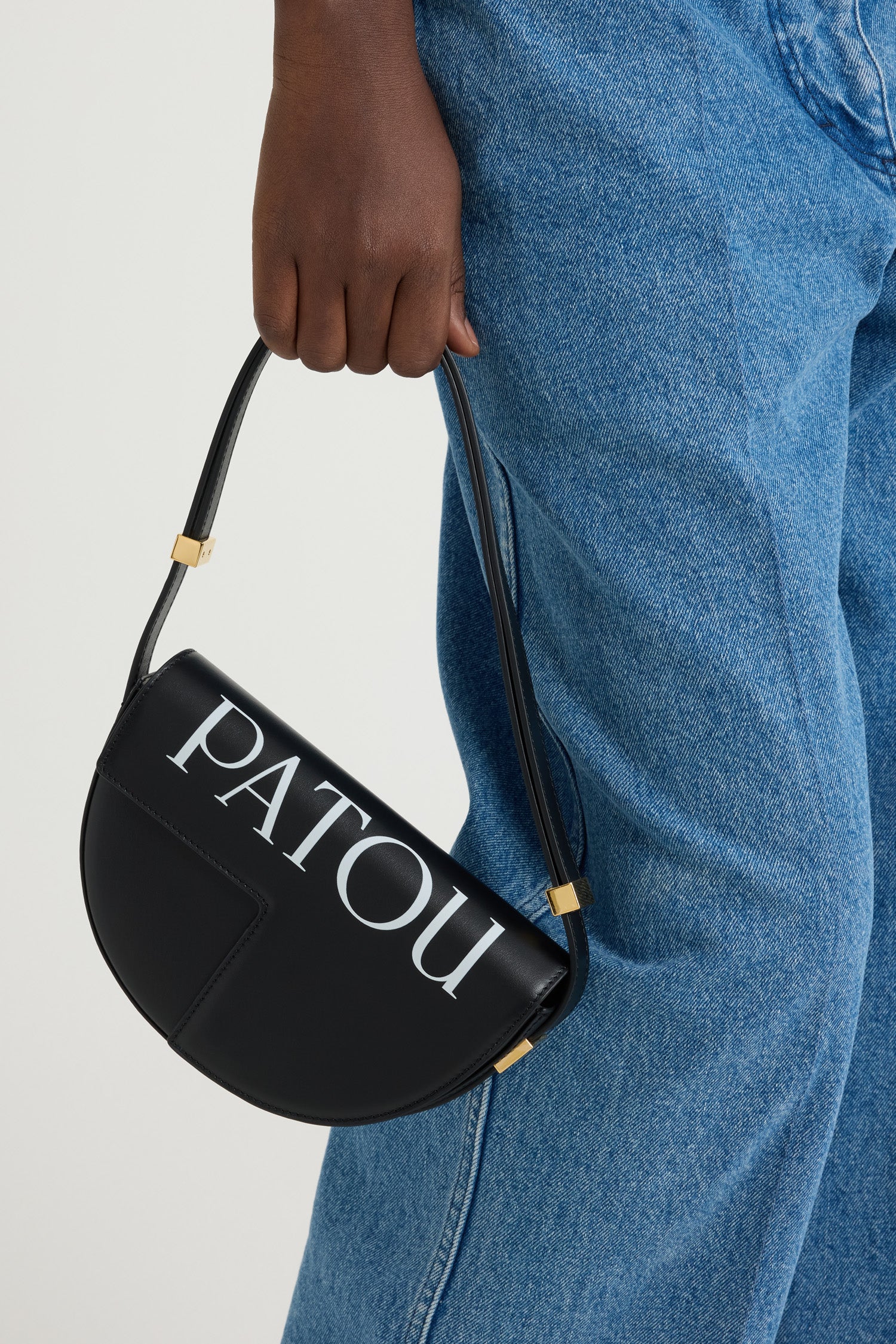 Patou Le Petit Patou sac cuir logo noir et blanc