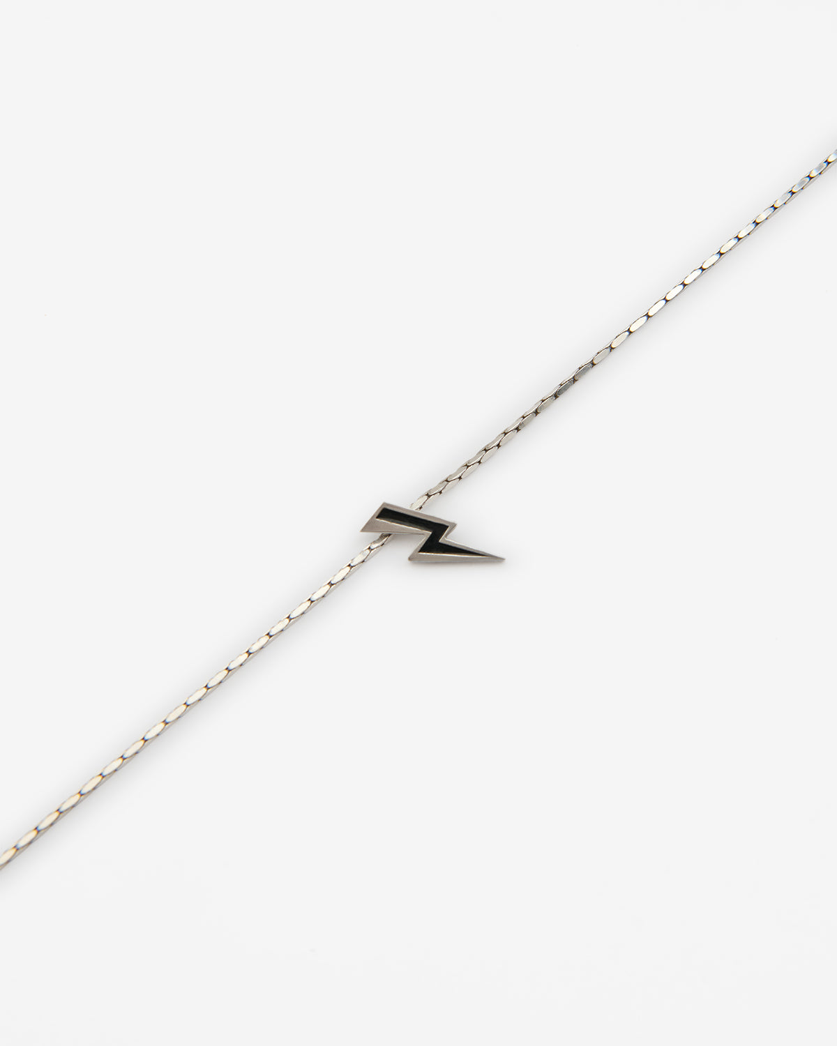 Isabel Marant Flash collier noir argenté pendentif éclair
