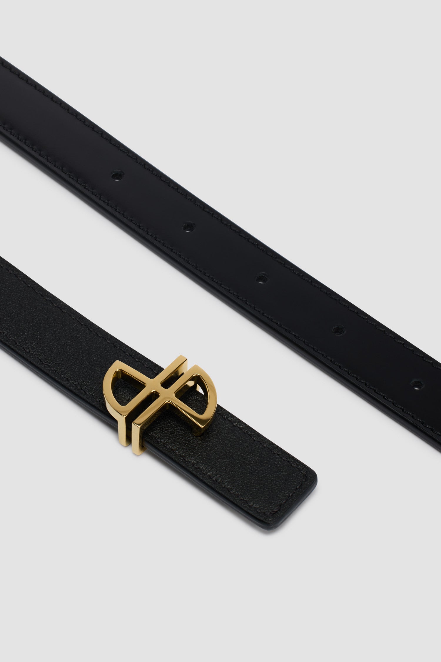 Patou ceinture fine cuir boucle JP noir réversible S