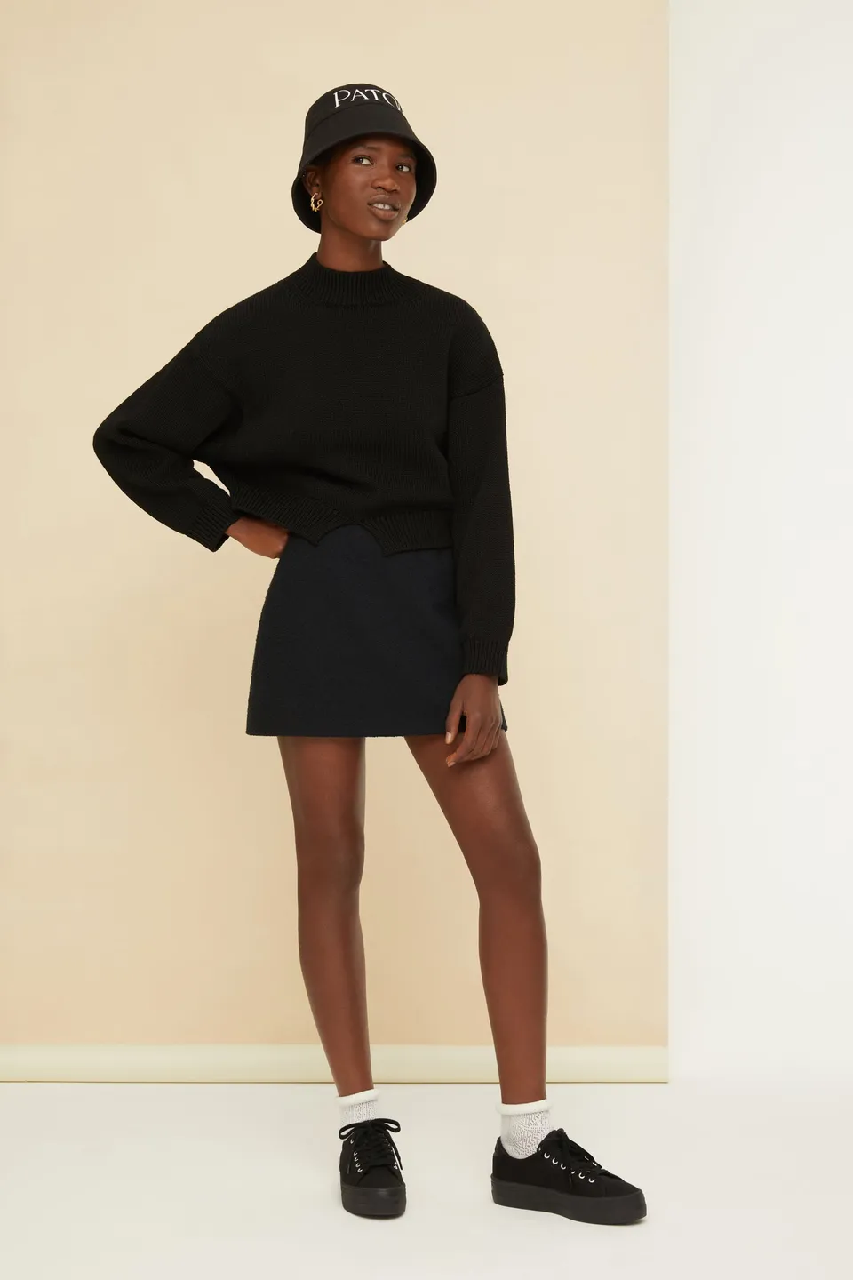 Patou SK025 mini jupe bouclé coton noire évasée