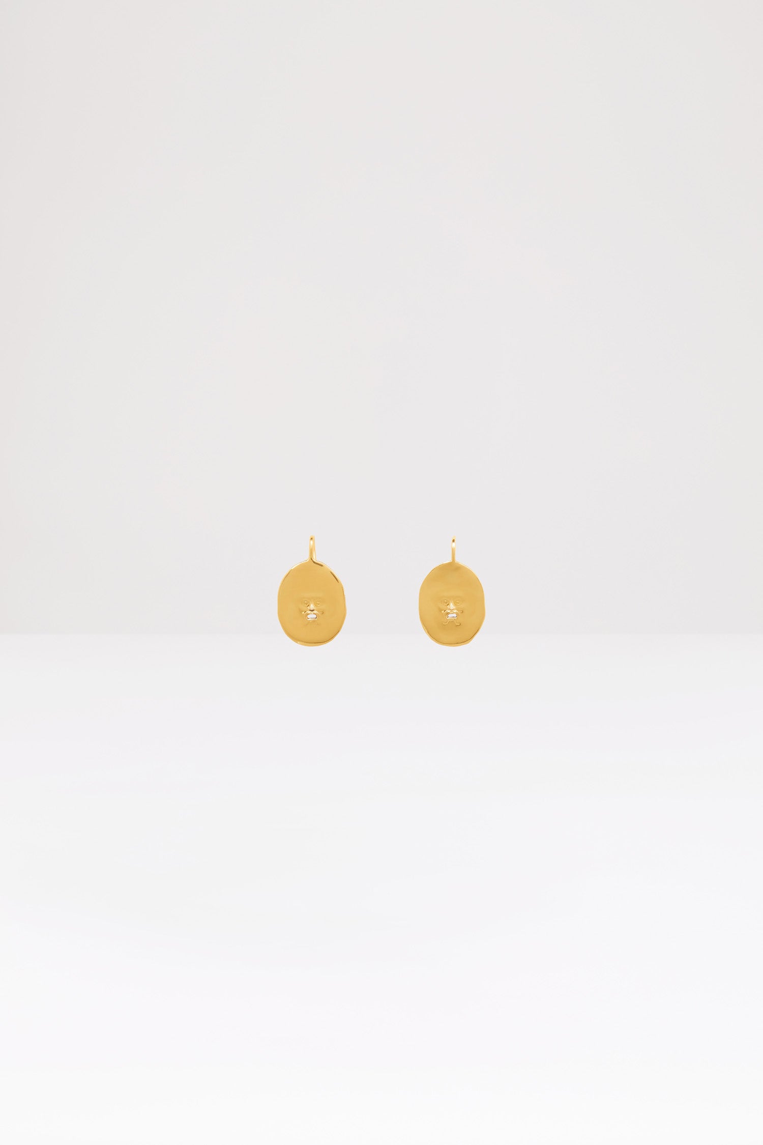 Patou JW046 boucles d'oreilles visage laiton doré