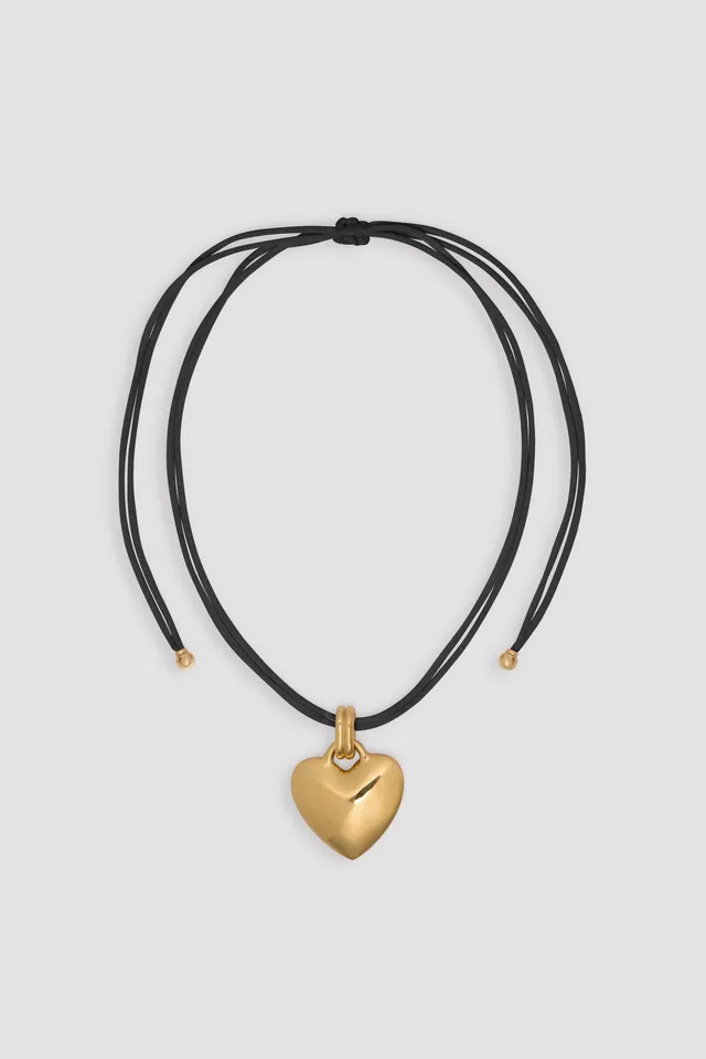 Patou JW150 collier coeur doré cordon noir