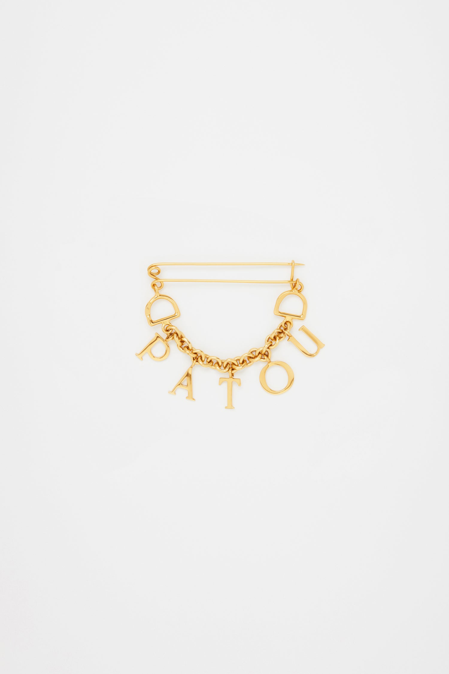 Patou P23JW0991002299G broche laiton doré Gold lettres