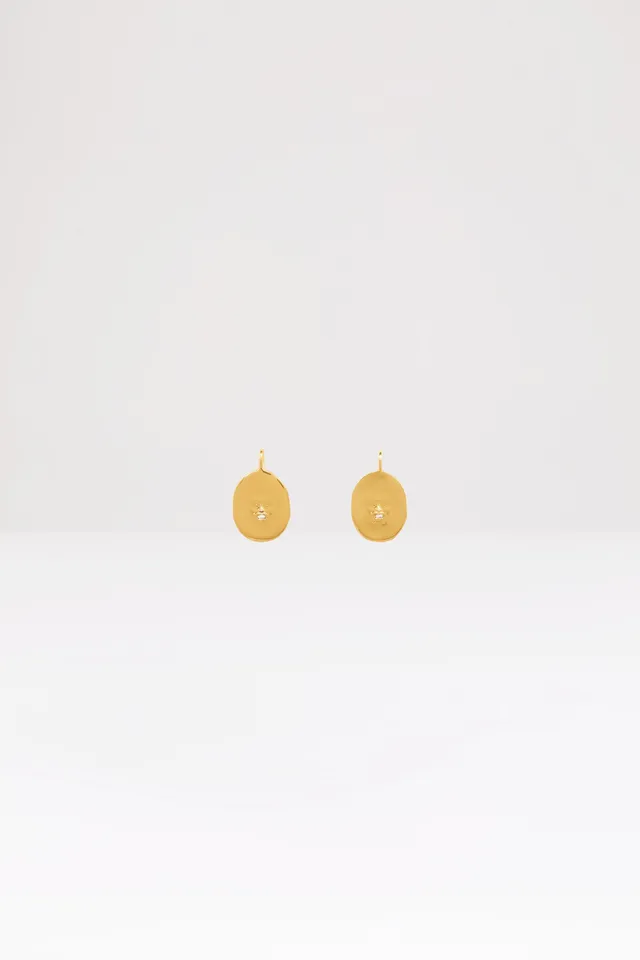 Patou JW046 boucles d'oreilles visage laiton doré